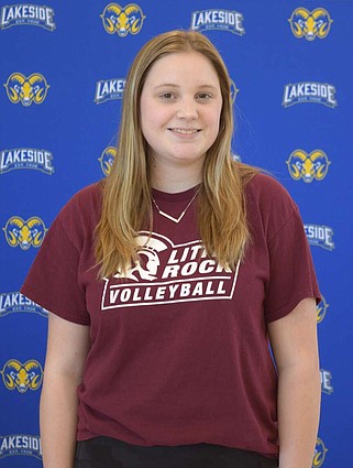 Lakeside senior MTXE volleyball player Lauren Foreman stands in the Lakeside Performing Arts Center after signing her national letter of intent to play college volleyball for the University of Arkansas-Little Rock, Friday. (The Sentinel-Record/Donald Cross)